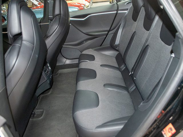 2017 black tesla s 75 back seat 1